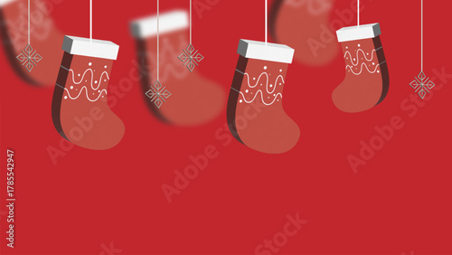 Red Christmas socks hanging with snowflakes and winter decorations