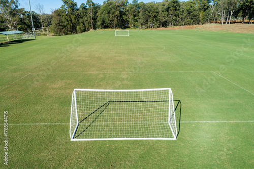 Aerial oblique view of soccer field and goals.