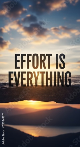 Inspirational sunset over the ocean with the motivational quote 'Effort is Everything' displayed in bold letters across the sky