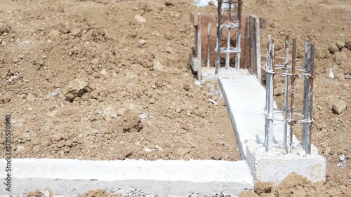 Concrete foundation with steel rebar construction site soil support building base, structural stability, groundwork preparation, durable engineering progress, outdoor unfinished development