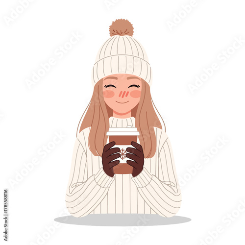 Young Woman in Cozy Winter Attire Holding a Warm Beverage.