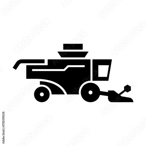 Harvester glyph icon. Harvester illustration.