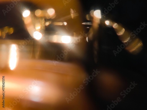 Bokeh background effect The atmosphere is very luxurious and precious. Glittering yellow gold diamonds fell. Contrasts beautifully with the black background.