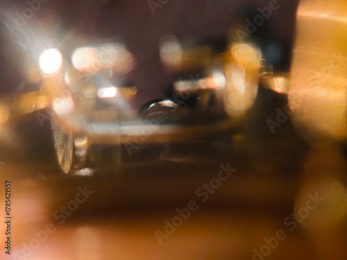 Bokeh background effect The atmosphere is very luxurious and precious. Glittering yellow gold diamonds fell. Contrasts beautifully with the black background.