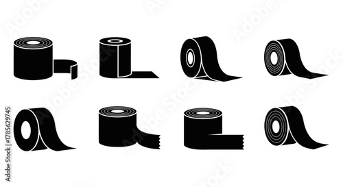 rolls of black adhesive tape arranged neatly in rows, isolated on white background 