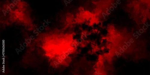 Abstract grunge red and black powder explosion cloud on black background. dark red smoke Like cloud wave effect on black. dark fire flame grunge texture background. toned fiery red sky.