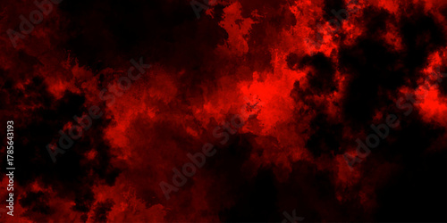 Abstract grunge red and black powder explosion cloud on black background. dark red smoke Like cloud wave effect on black. dark fire flame grunge texture background. toned fiery red sky.