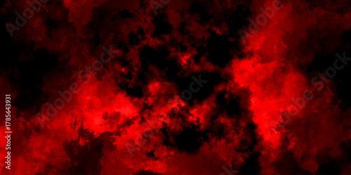 Abstract grunge red and black powder explosion cloud on black background. dark red smoke Like cloud wave effect on black. dark fire flame grunge texture background. toned fiery red sky.