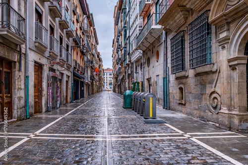 Rainy Cobblestone Street Estafeta in Pamplona Old Town, Spain, Known for the Running of the Bulls during San Fermin Festival