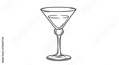 Elegant martini glass with liquid for celebration and cocktails