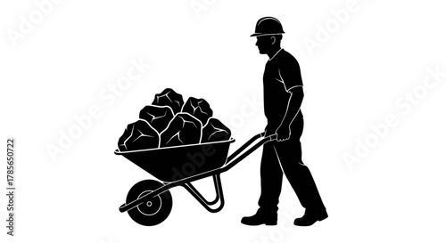 Hardworking construction worker hauling rocks in wheelbarrow design