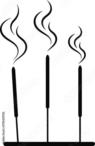 Three black incense sticks with smoke on white background burning aroma