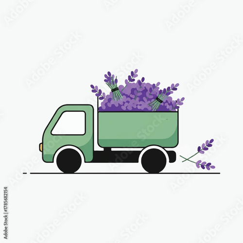 A green truck filled with lavender with some dropping out