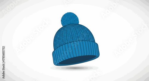 Vibrant blue knitted winter beanie with a fluffy pom-pom offers stylish warmth for cold weather adventures