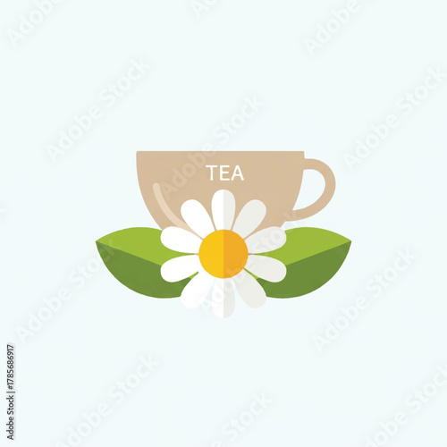 A teacup with TEA written on it a daisy and two green leaves