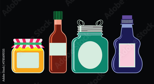 Assorted colorful bottles and jars with labels on black background
