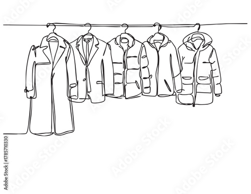 Wardrobe sketch. Clothes on the hangers. Coats and jackets on hangers