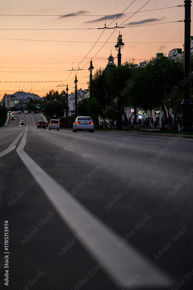 custom made wallpaper toronto digitalthe highway of the city at sunset with cars passing along it