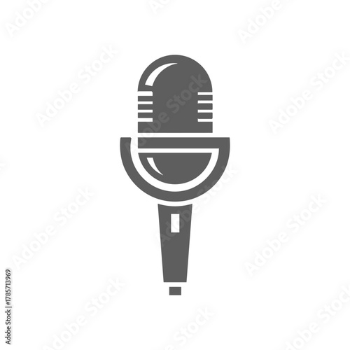 A simple, stylized, gray icon of a vintage microphone on a white background.