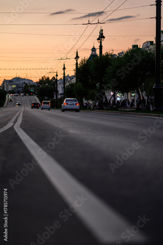 Wallpaper Mural the highway of the city at sunset with cars passing along it Torontodigital.ca