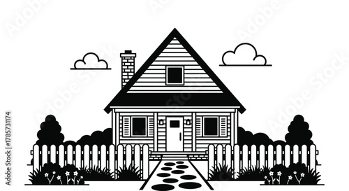 Charming black and white cottage with picket fence and stone pathway