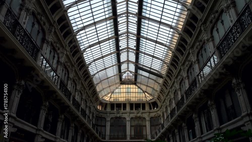 Italy, Turin, 11-10-2024. Low view, internal ancient glass Subalpina gallery. Tilt 4K