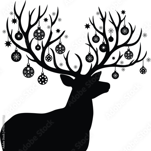 Vector silhouette of a deer and a tree set in wildlife nature, perfect for a Christmas card design or winter illustration