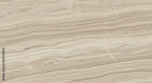 Natural beige marble surface with distinctive horizontal veins and smooth polished texture for elegant interior design