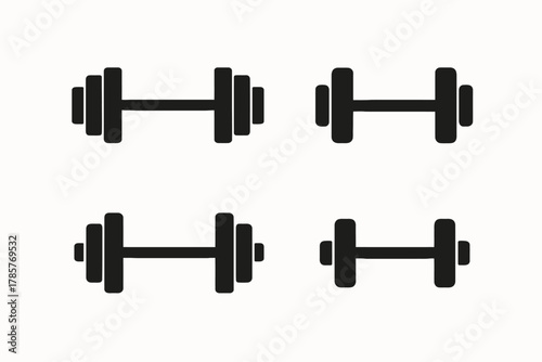 Set of four minimalist black dumbbell and barbell icons on white background