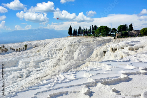 Pamukkale showcases remarkable white travertine terraces formed by mineral-laden thermal waters.Geology landmark in Turkey