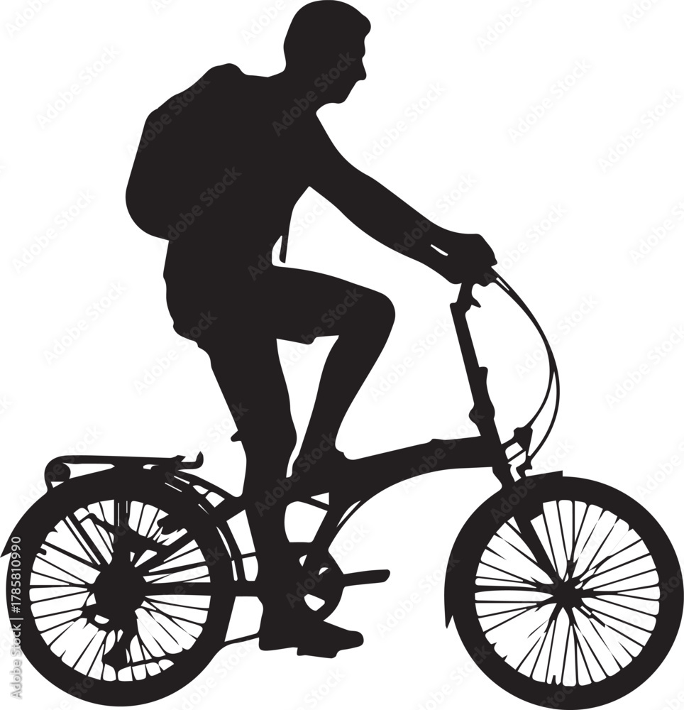 Obraz premium Silhouette of a person riding a folding bicycle with a backpack