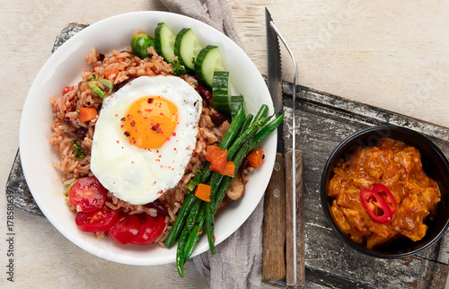 ndonesian nasi goreng (fried rice) served on a plate.