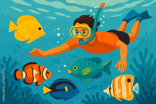 A young male snorkeler with dark hair wearing an orange shirt and snorkel gear swims underwater, surrounded by colorful tropical fish in a vibrant ocean setting.