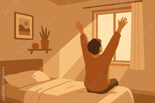 Young adult caucasian male sitting on a bed, stretching with uplifted arms in a warmly lit bedroom.