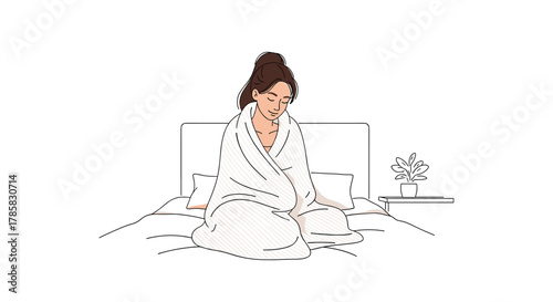 Young adult caucasian female sitting on a bed wrapped in a blanket, with a small plant on a nightstand beside her.