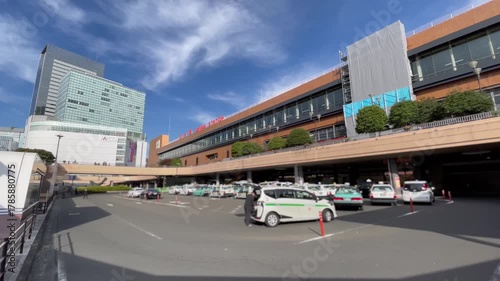 SENDAI, MIYAGI, JAPAN - NOV 2025 : Exterior of Sendai station. Major junction railway station in Aoba-ku downtown district. Transportation, travel and tourism concept video. Shot in sunny daytime.