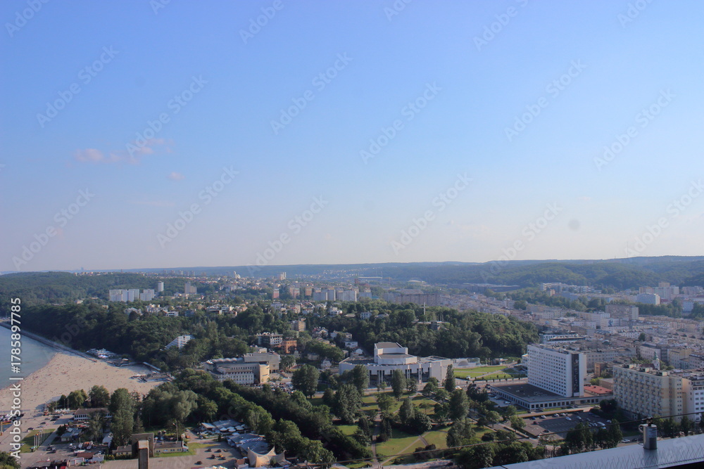 Fototapeta premium Panoramic view of Gdynia city and beach on Baltic Sea coast on sunny day