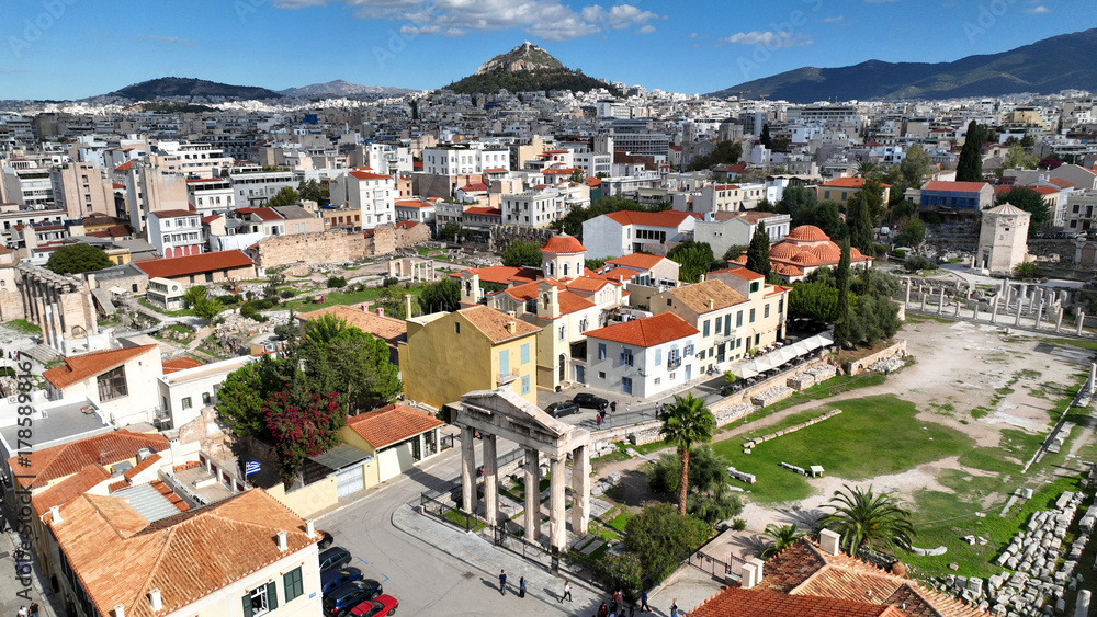 Fototapeta premium Aerial drone photo of iconic Roman Market featuring tower of Winds and Gate of Athena in the heart of Athens historic centre built in Plaka district, below Acropolis hill, Attica, Greece