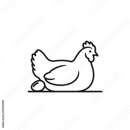 Chicken laying egg silhouette vector icon on white background