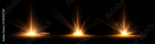 Golden light bursts, light explosions on a black background with rays and glare. Suitable for entrance scenes, magic, shows, and festive effects.