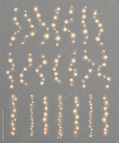 Warm vertical Christmas light strings with glowing golden bulbs and soft bokeh on transparent background. Festive garlands for winter holiday decor, overlays, invitations and web design.