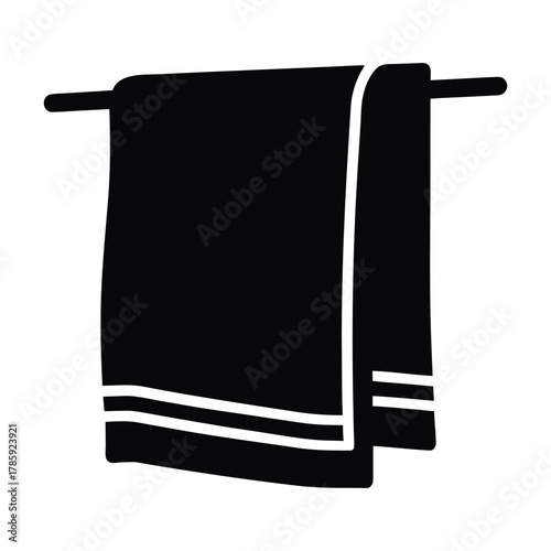 Black bathroom towels hanging on a rack for drying and cleaning in a modern home interior design