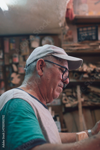 Senior craftsman working in his traditional workshop