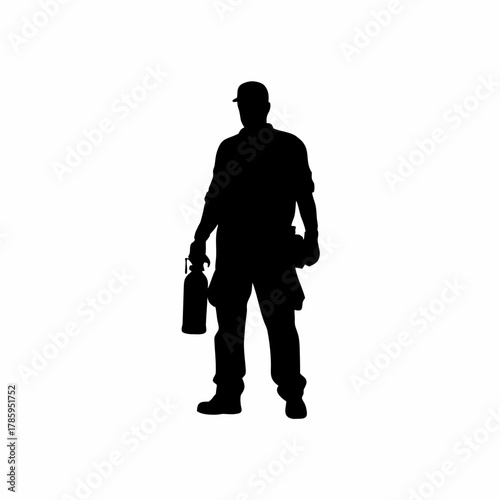 Silhouette of industrial safety officer checking fire extinguishers in a warehouse isolated on white background