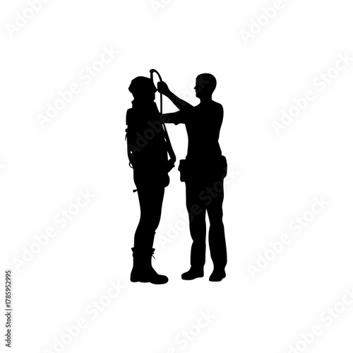 Silhouette of safety officer checking construction worker s harness isolated on white background