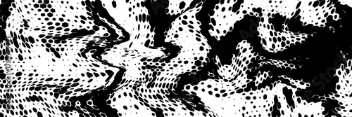 Dark gray or black hexagonal tiles with thin, contrasting white grout lines, forming a geometric honeycomb pattern. The surface has a gritty, distressed, and moody texture