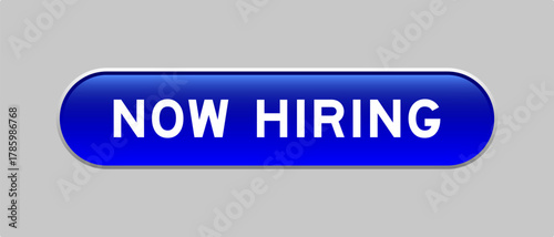 Blue color capsule shape button with word now hiring on gray background