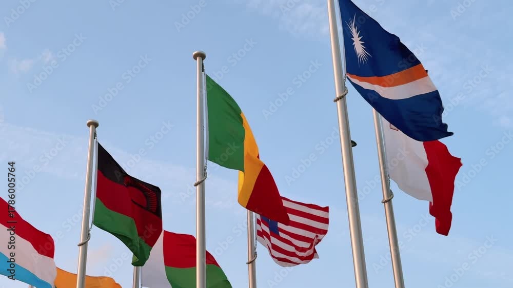 Video „Seven national flags wave gracefully together in the breeze ...