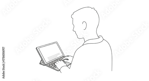 Man s silhouette typing on a tablet with a keyboard attachment working on a project or writing an email