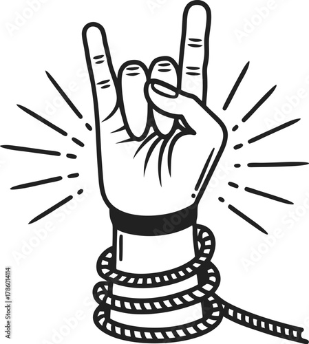 hand making rock and roll gesture with rope tied around wrist rebellion, freedom, music culture, power and resistance concept